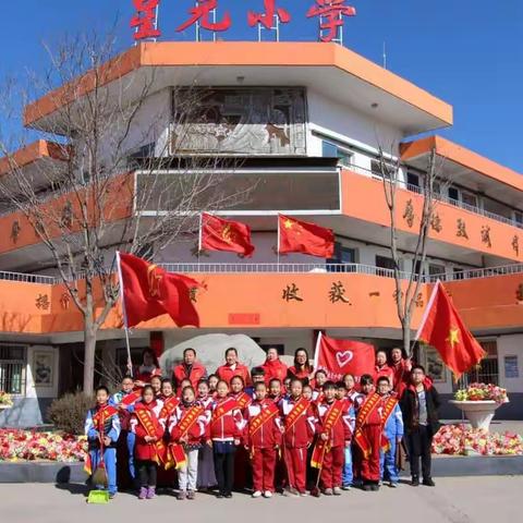 弘扬雷锋精神  志愿者在行动         ——榆林市星元小学开展党员进社区“学雷锋 献爱心”主题党日活动