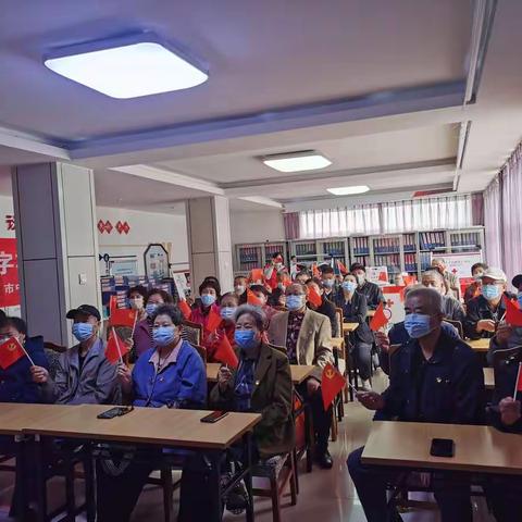 七里山街道七东社区综合党委组织党员集体收看党的二十大开幕会