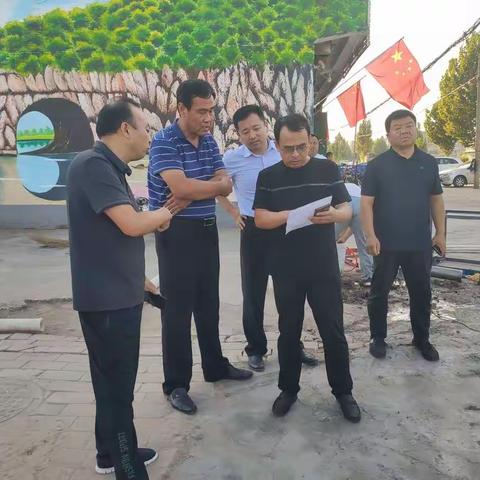 9月25日下午，区领导王玉刚现场督导标准件十里长廊整治工作