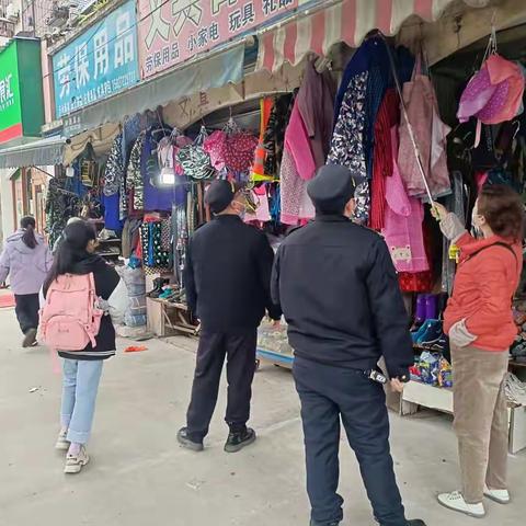 落实“门前三包” 保持整治成效