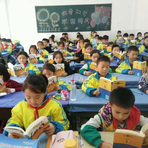 〔焦瑞民〕城关镇西完小四（3）班：快乐阅读，与智慧同行。