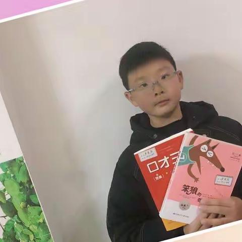 弘扬雷锋精神  做新时代好少年——记学雷锋实践活动  四（2）班 卢奕辰