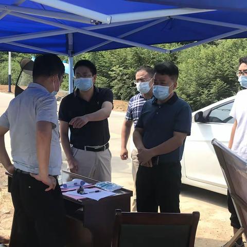 政协副主席艾明华到红光垦殖场检查督导疫情防控工作