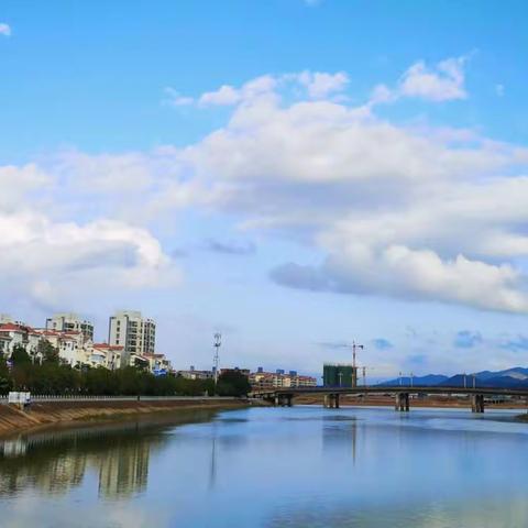 那条川流不息的明江河……