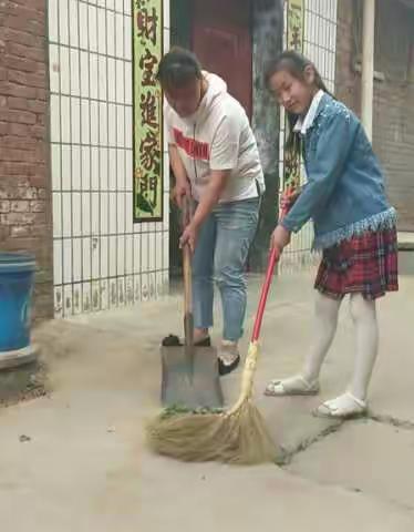 小手拉大手，共建美好家园――西张门小学环境整治系列活动