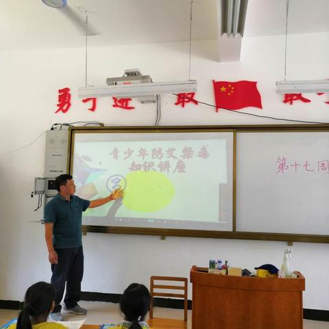 远离毒品，关爱生命――记三里镇石社小学青少年禁毒知识安全教育活动