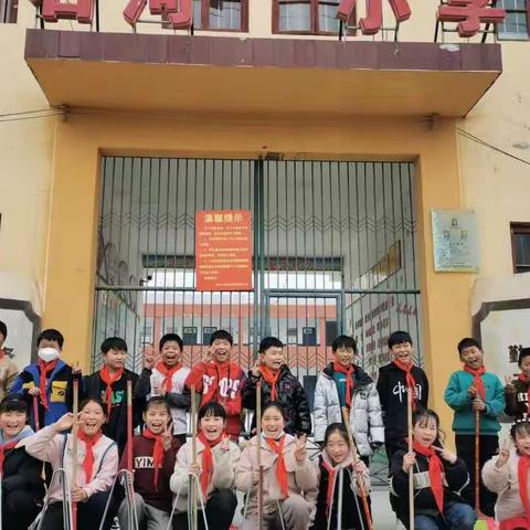 石河小学“践行雷锋精神，弘扬文明新风”雷锋日活动