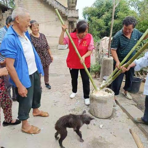 光辉村"打糍粑、吃月饼、团团圆圆庆中秋"活动