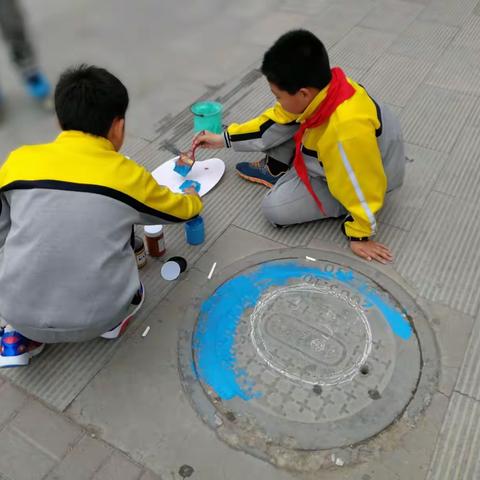 青海省西宁市城西区新宁路小学 开展彩绘校园井盖涂鸦绘画大赛