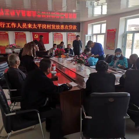 不忘初心建乡村 政银协力助春耕