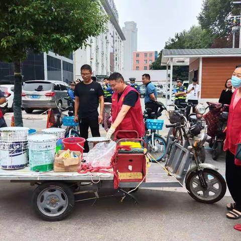 《同建文明城市，共创美好家园》——沙北街道昆仑社区协城市管理局整治门前三包
