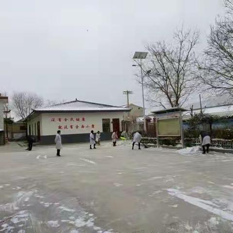 【创建文明城市】扫雪除冰在行动 美化家园显文明
