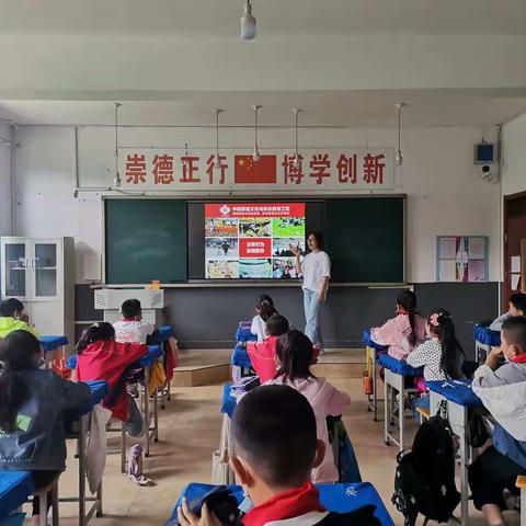 学做优秀中国人——小返学校家校协同班队会