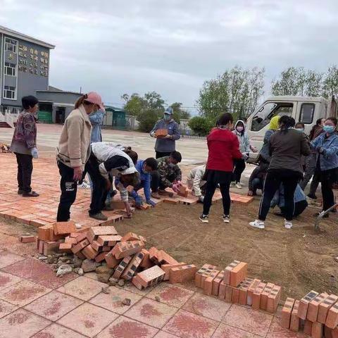 最美志愿者——朝阳地小学家校共建绿色校园活动七