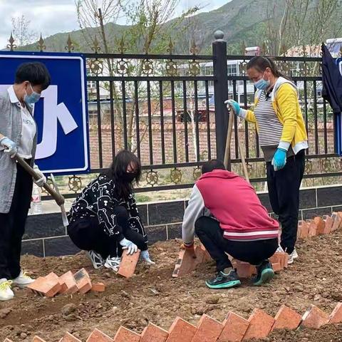 最美志愿者——朝阳地小学家校共建绿色校园活动八