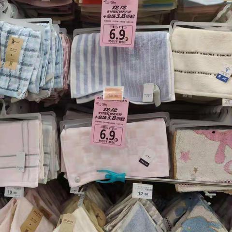 黄冈店（1088)服装针锦双十二折扣标示图片
