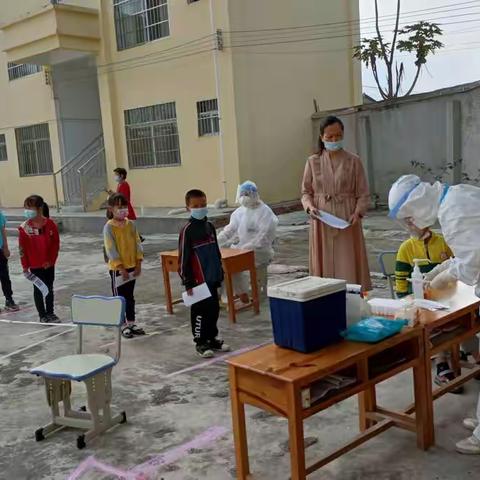 众志成城     同心抗疫——玉林市小平山电力希望小学浪平分校全体师生开展核酸检测