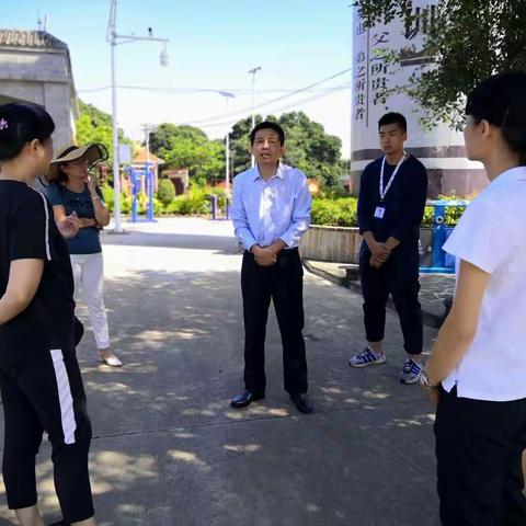 秀英区卫健委主任徐柏周到石山镇施茶村委会美富村指导慢性病综合防控示范区迎检工作