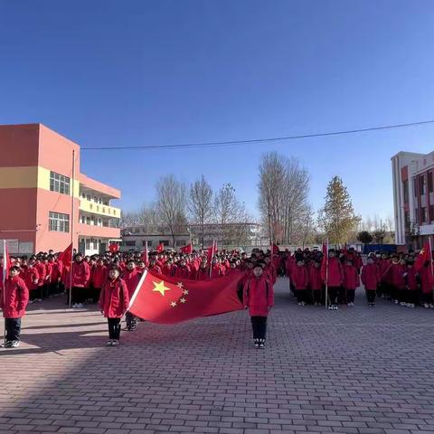 金斗营镇小学第十二周主题升旗暨“红领巾奖章”争章活动启动