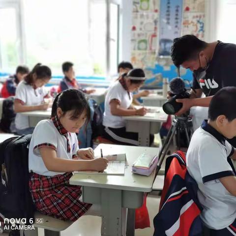 四平电视台到农场中心小学采访“吉林省美德少年”胡雨桐