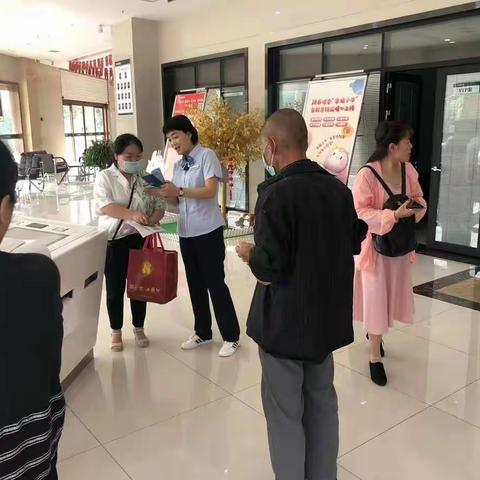 【信合党旗红，企业文化红】乾县联社开展”央行清算走进千企万户“宣传活动