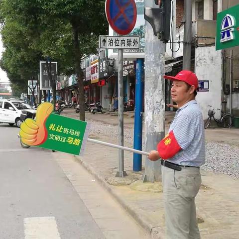 文明劝导党员行  汤小助力文明城