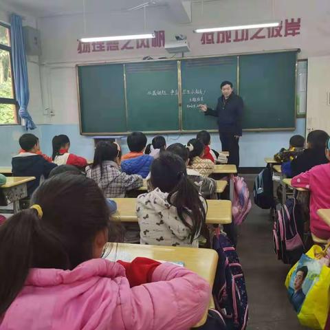 “小手牵大手，家校共参与”              中和镇艾田小学