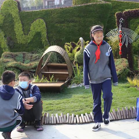 “迎亚运·学雷锋，争当富春学子”——富春中学七（11）班向日葵小分队在行动！