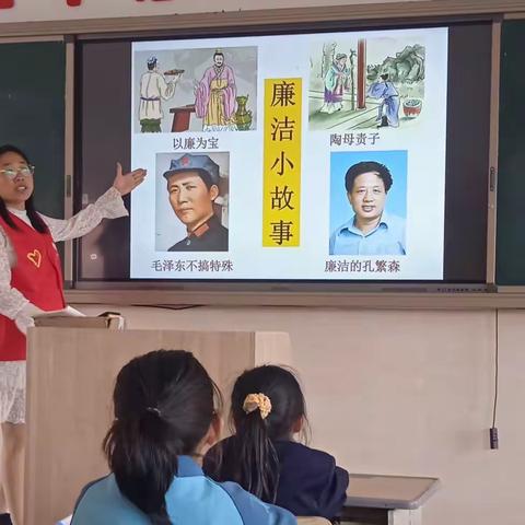 颂廉洁 扬正气———云峰中心学校党员志愿者活动