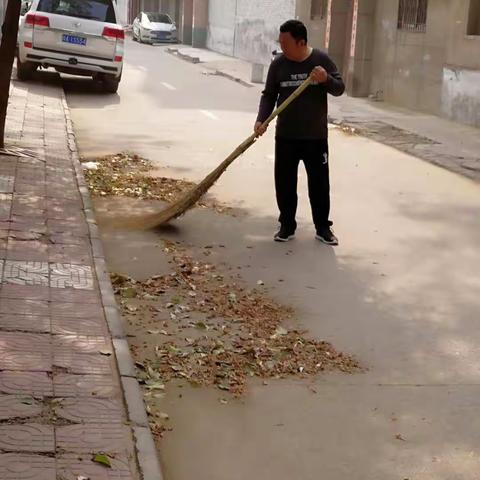 市容整治你我有约—区残联“路长制”整治环境卫生行动