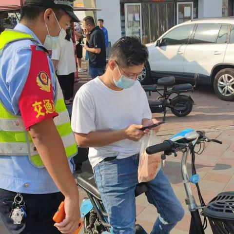 曹妃甸交警开展电动自行车安全驾驶问答活动