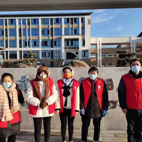 冬日护学岗，温情暖校园——白阳小学爱心护学岗活动