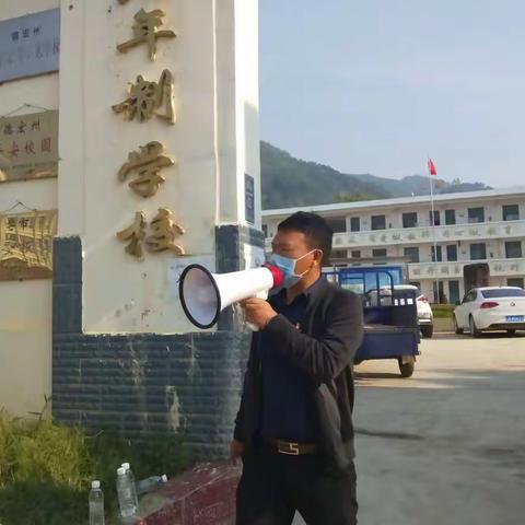 落实疫情防控，确保平安开学——芒海镇九年制学校五至八年级开学第一天