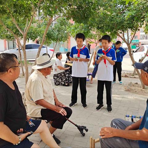 【文明实践在行动】科右中旗社区党工委满都拉社区开展“小手拉大手 共创文明城”红领巾在行动宣传活动