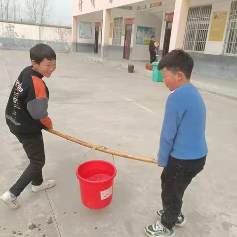 风催新绿，植树正当时——任庄小学植树节活动