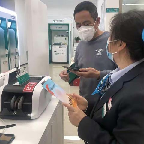 识假币，反假币--农行西安草滩农场支行5·15反假币宣传活动
