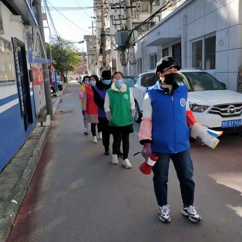 铁塔街道办事处平安建设进万家五彩志愿者服务队宣传活动