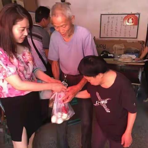 民安社区开展“浓浓端午意，丝丝粽子情”端午节慰问活动