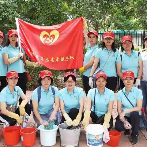 美丽富民  ，清洁家园！             ——富民县幼儿园党员志愿者服务活动