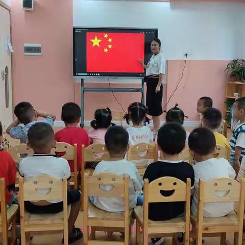 安乡县第二中心幼儿园小六班庆国庆主题活动：五星红旗在飘扬