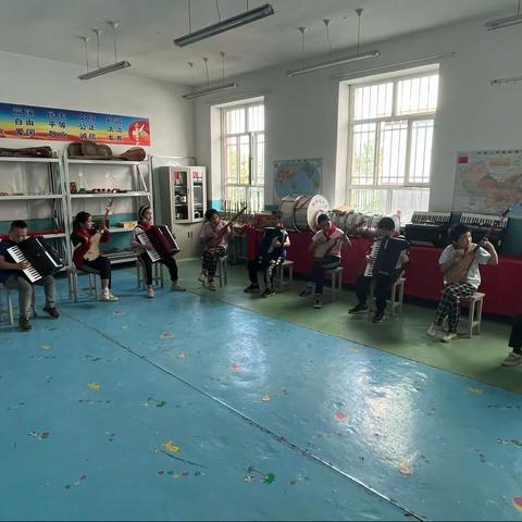 乌恰县波斯坦铁列克乡种羊场小学2021-2022年第二学期器乐社团小组课后服务活动总结