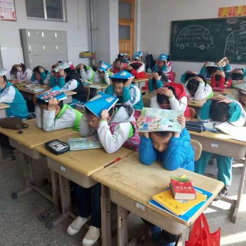 官庄小学进行应急安全消防疏散演练活动