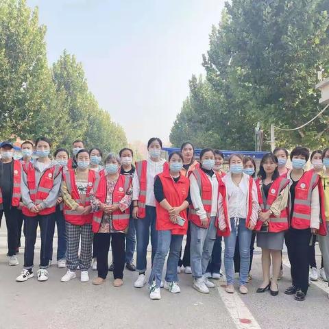 为爱而行！3.2班爱心护学岗