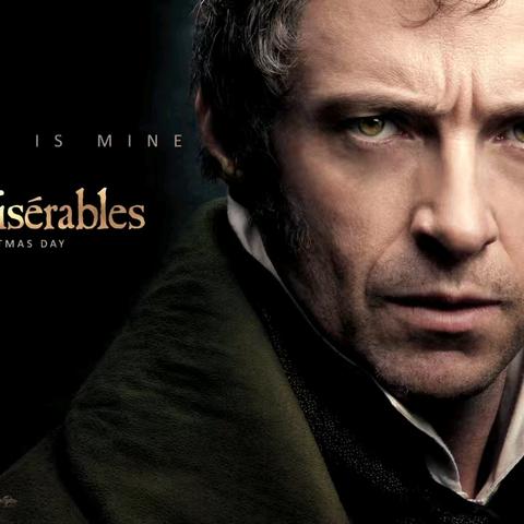 悲惨为面纱 慈悲为底色