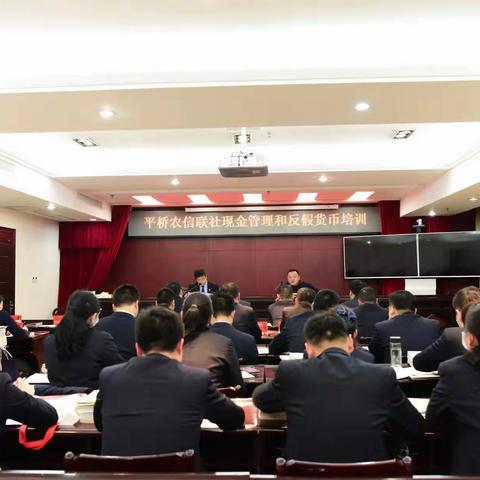 平桥农信联社认真开展文明祭扫、正确使用人民币宣传活动