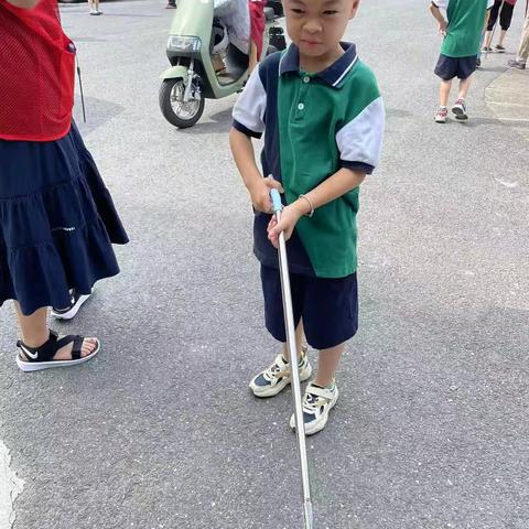 垃圾不落地，地球更美丽——明镜小学104海燕中队阳光小队暑期社会实践活动