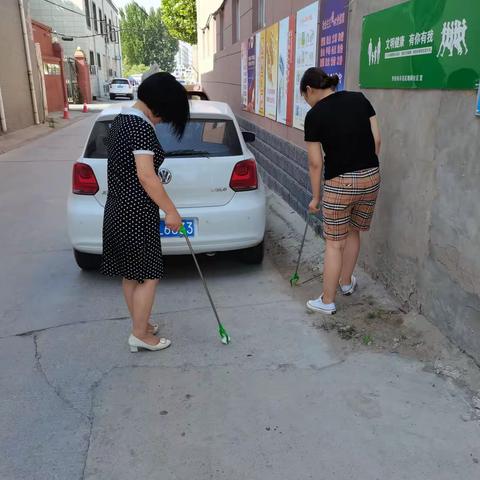 魏都社区开展周五巩卫清洁活动