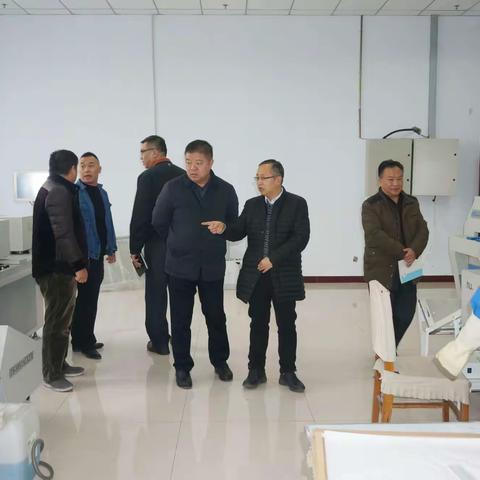 报社总编逯江、编委朱健在印刷厂调研指导工作
