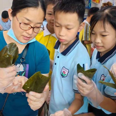 “粽”么快乐的“六一”                         ——实验小学六5班