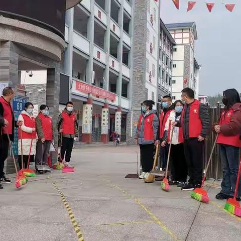 宁化县安远中心学校党支部开展“清沟扫地整环境”主题党日活动